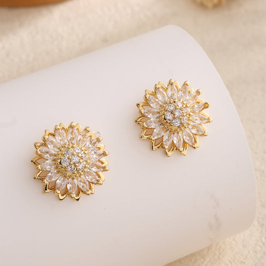 Aretes Girasol Giratorio: Amor y Luz